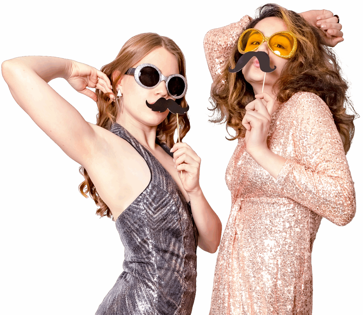 Two women wearing playful fake mustaches and stylish dresses.